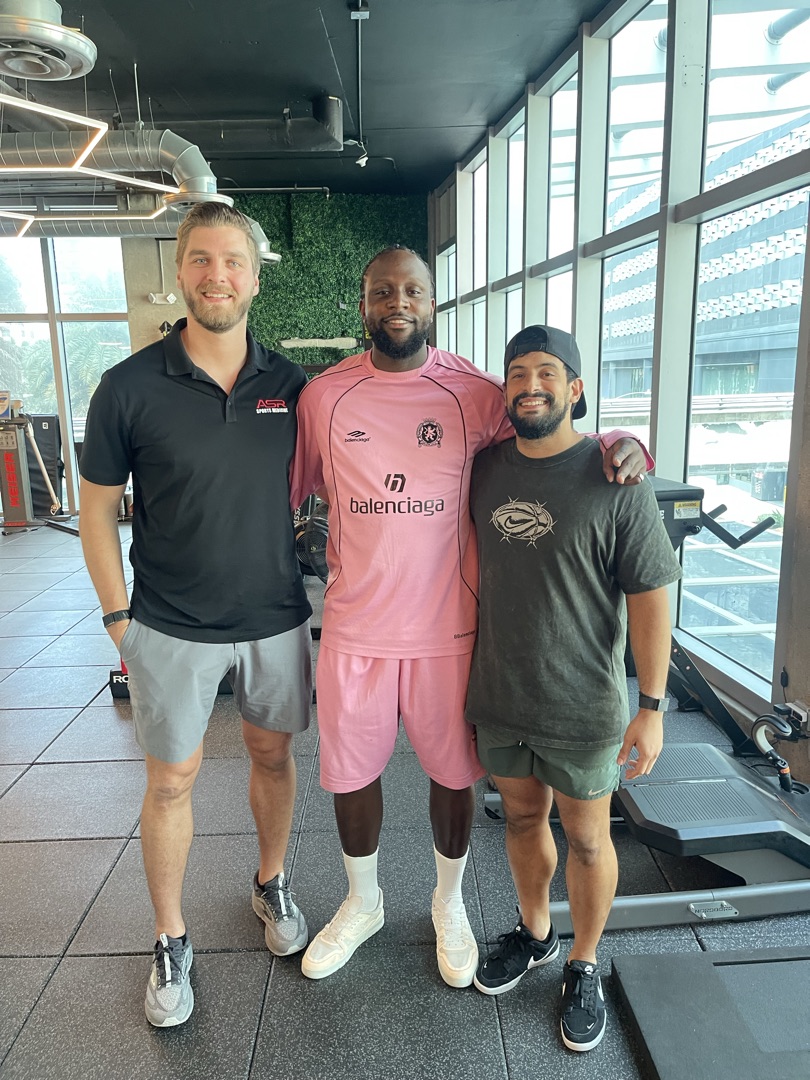 Roger with Romelu Lukaku at Crown Performance facility