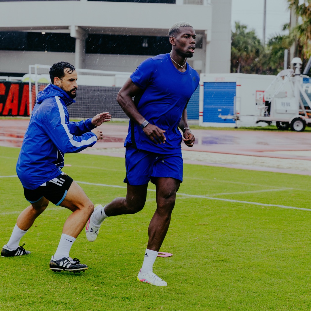 Roger Caibe training with Paul Pogba on the field in Miami