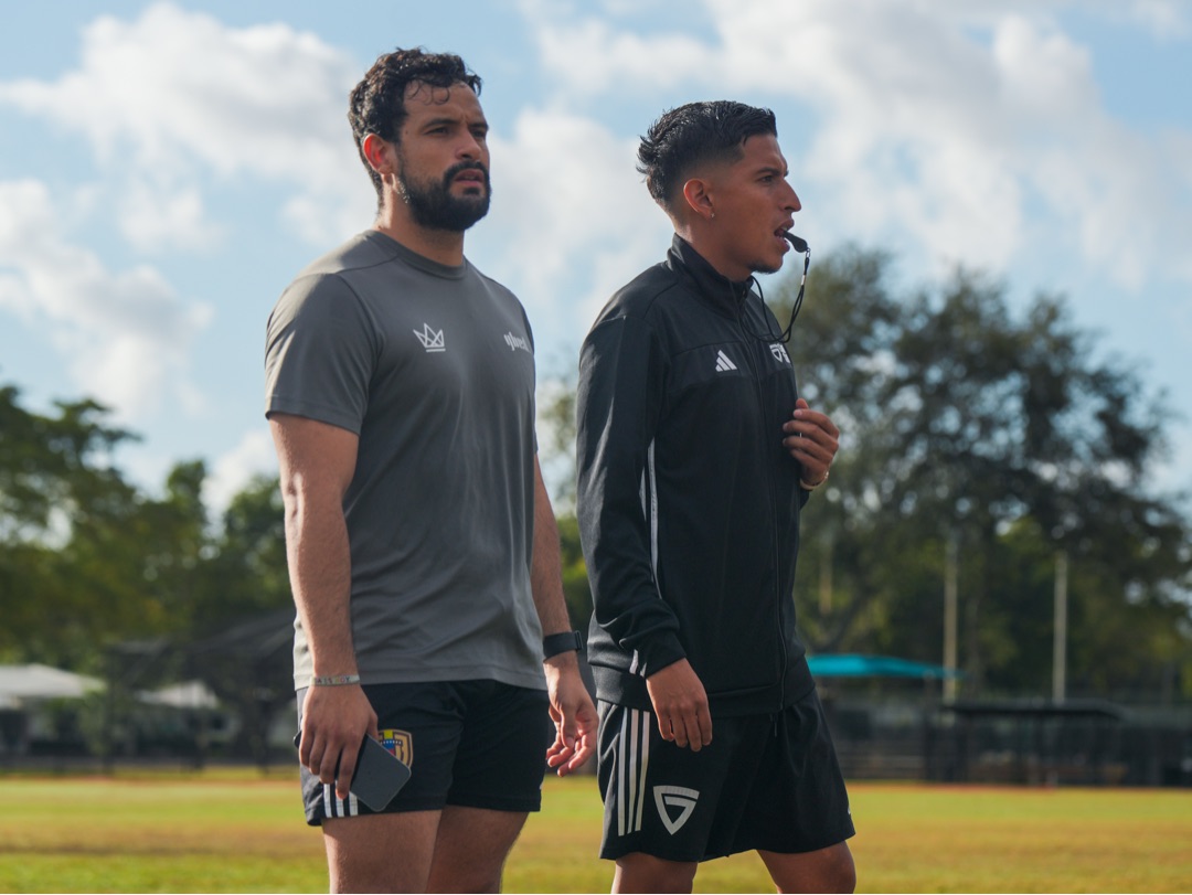 Roger Caibe coaching on the training field